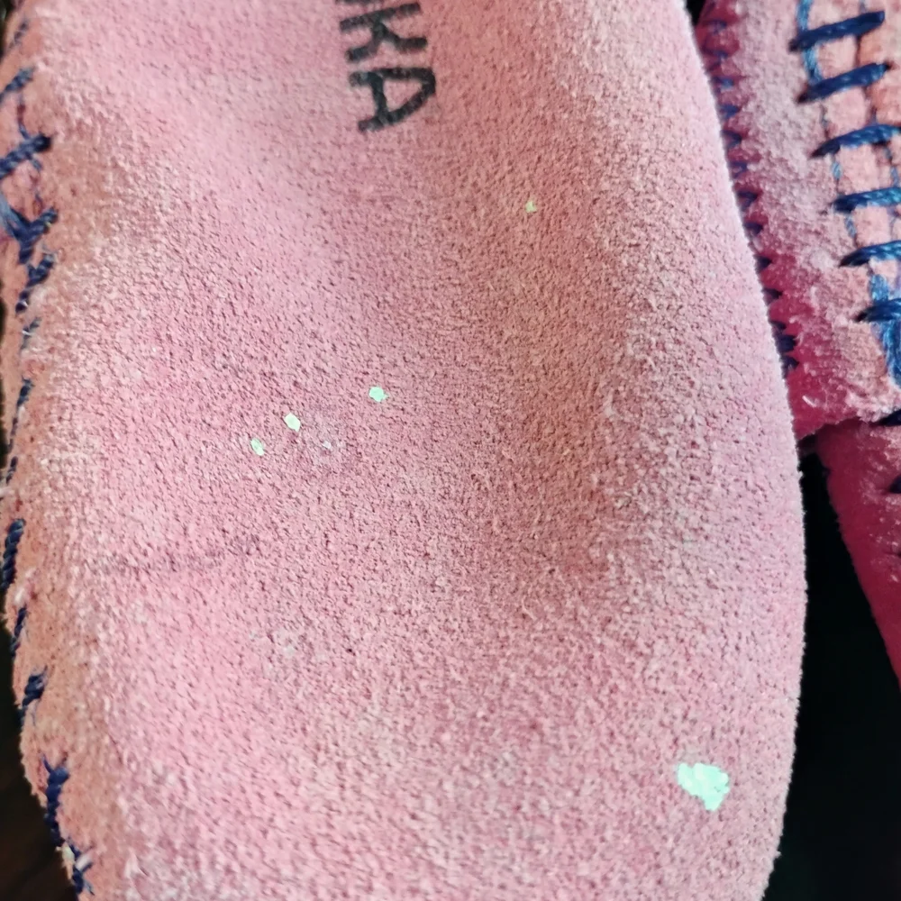 Minnetonka Pink Fringed Baby Moccasins